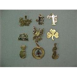 ONE LOT OF NINE 14K GOLD CHARMS - CHARMS IN