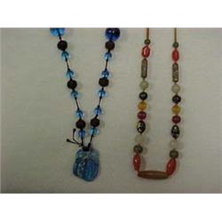 TWO ORIENTAL BEADED NECKLACES - 34" TIED AN