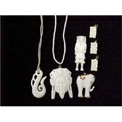 SEVEN IVORY PENDANTS