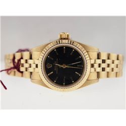 Rolex Ladies 18k Gold Oyster Perpetual.