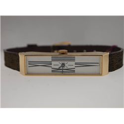 Elongated Ladies Gold Watch on Leather Strap.