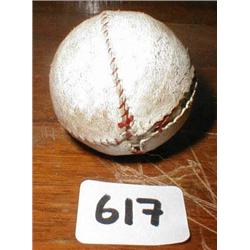 A feather filled leather cased small ball