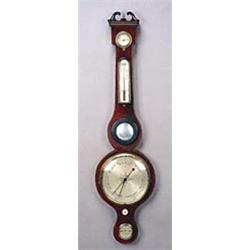 J. Mangiacavalli; A mid 19th century mahogany and boxwood banded wheel barometer, with silvered dial