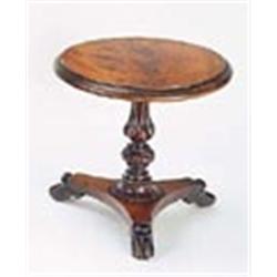 A William IV mahogany miniature breakfast table, the round tilt top with a moulded edge on turned an