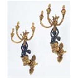 A pair of late 19th century ormolu and bronze wall lights each cast with acanthus scrolls, with thre