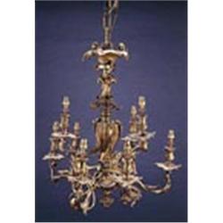 A 19th century ormolu chandelier in rococo style, cast overall with acanthus scrolls, with a central