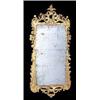 Image 1 : A mid 18th century giltwood mirror, the rectangular bevelled plate with a leaf, flower and scroll ca