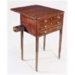 A late George III mahogany work table, the crossbanded rectangular top with rounded corners and a dr