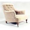 Image 1 : A Howard & Sons armchair, upholstered in pale moquette with a buttoned back and sides, on mahogany t