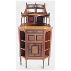 A late 19th century Gillow & Co mahogany corner cabinet, the superstructure with spindle gallery, be