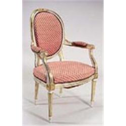 An early 20th century French painted and gilded open armchair, in late 18th century style, the oval