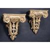 Image 1 : Two 18th century giltwood wall brackets, carved with scrolls and egg and dart borders, above a shell