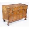 Image 1 : An early 19th century Scandinavian walnut commode, with three long drawers, the upper drawer outset,