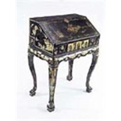 A 19th century Chinese export bureau, black and gilt lacquered with lake scenery and flowers, the in