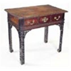 A mahogany side table, the rectangular top with a ribbon and flower carved border above  a blind fre