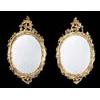 Image 1 : A pair of late 18th century giltwood wall mirrors, each mahogany frame with an acanthus crest and sc
