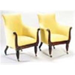 A pair of George IV library armchairs, the upholstered tub backs with U' shaped fronts faced in maho