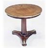A mahogany table, the round top with brass band on octagonal tapering column and concave platform wi