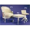 An armchair and a music stool, the chair with a painted frame carved with beaded border and leaf scr