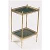 A French brass two tier table, with turned finials, pierced galleries and leather insets with reeded