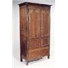 Image 1 : A late 18th century French oak provincial armoire, the concave cornice with rounded corners above tw