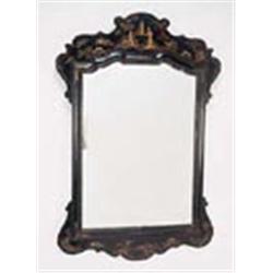 A fret framed wall mirror, the japanned frame with chinoiserie figures and landscapes on a black gro