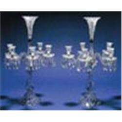 A pair of 20th century Baccarat press-moulded glass five-branch candelabra, each moulded with spiral