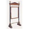 A walnut, ebony strung, ebonised and parcel gilt cheval mirror in Empire style, with architectural p