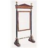 Image 1 : A walnut, ebony strung, ebonised and parcel gilt cheval mirror in Empire style, with architectural p