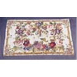 A mid 19th century needlework rug woven with a bold design of lilies, irises and  roses and other fl