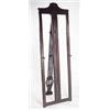 A late 19th century mahogany easel, with shaped and reeded crest, blind fret frame and pierced strut