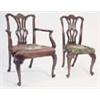 Image 1 : A set of ten mahogany dining chairs, each with a leaf carved serpentine crest rail, a vase shaped sp