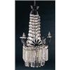 A rectangular cut glass light fitting with star shaped finials and tiers of rectangular glass rods,