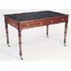A George IV mahogany writing table, the rectangular crossbanded top with a leather inset rounded cor
