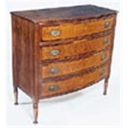 A late George III mahogany bowfronted chest, with four birds eye maple and crossbanded drawers on tu