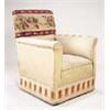 Image 1 : An early 20th century armchair upholstered with woolwork panels and pale green silk, on square taper