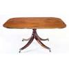 A Regency mahogany breakfast table, the rectangular tilt top with rounded corners and an ebony strun