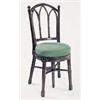 A late George III mahogany music stool, the back with leaf carved finials and pierced gothic arches,
