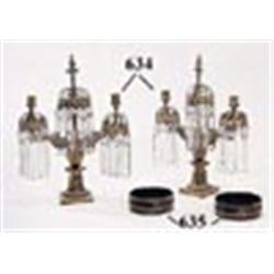 A pair of early 19th century ormolu and gilt metal three light  lustres the two candlearms hung with