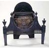 A cast iron serpentine fire grate in Adam style with an arched back, a sunburst front and cornucopia