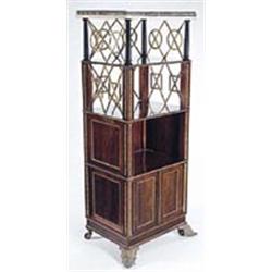 A Regency rosewood whatnot with stiff leaf ormolu mounts, the white marble top on ebony columns with