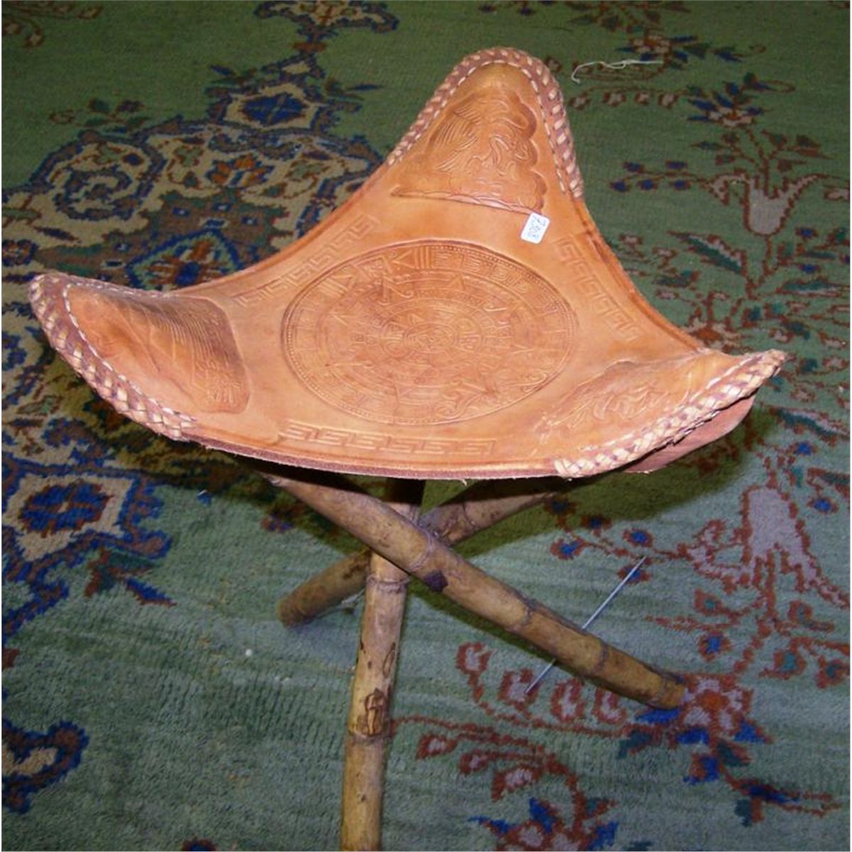 leather tripod stool