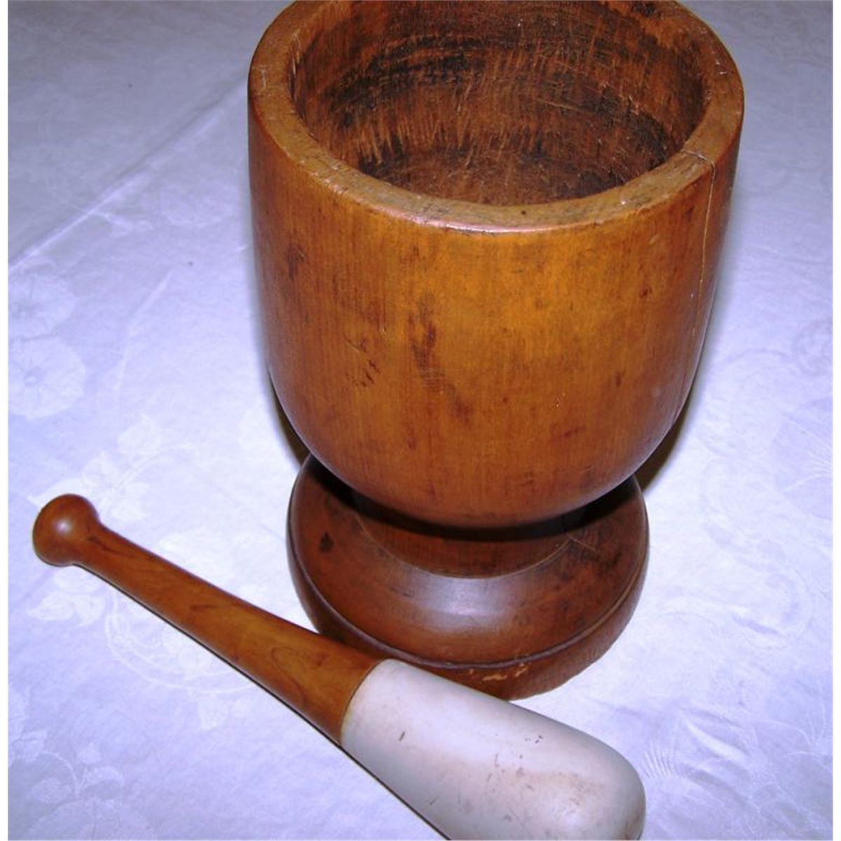 Wooden mortar and pestle.