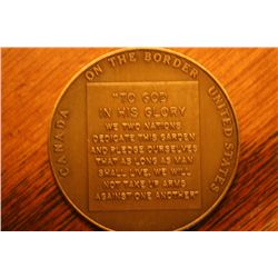 brass token july 1964 canada on the boarder us