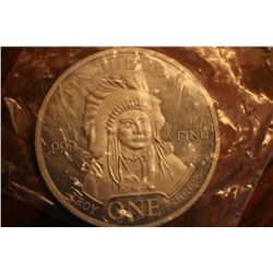 one troy ounce of tin