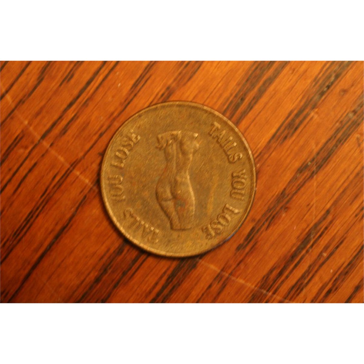 heads I win tails you lose token