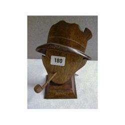 A CARVED WOODEN BUST, "BING SMOKING PIPE".