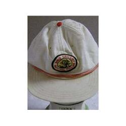 A WHITE BING CROSBY NATIONAL PRO-AM GOLFING CAP (LABELLED BING CROSBY INSIDE).
