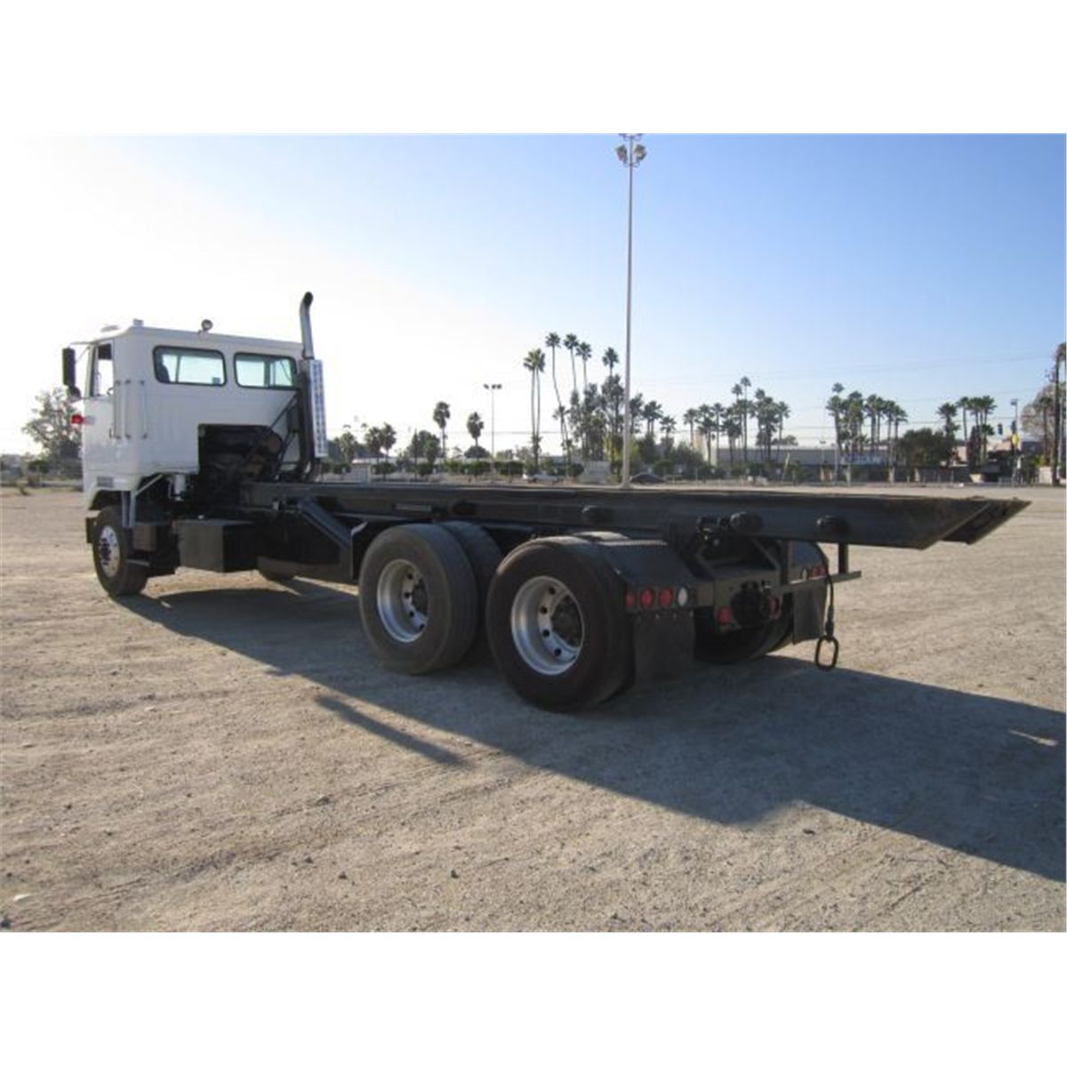 1995 White GMC Cab Over Roll Off Truck