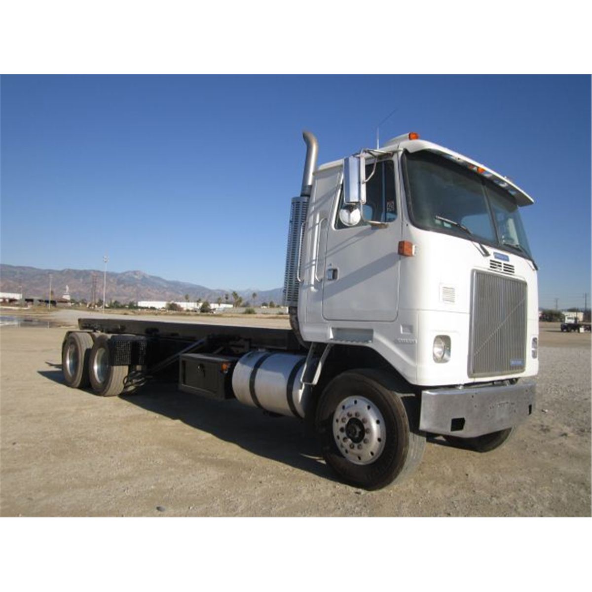 1995 White GMC Cab Over Roll Off Truck